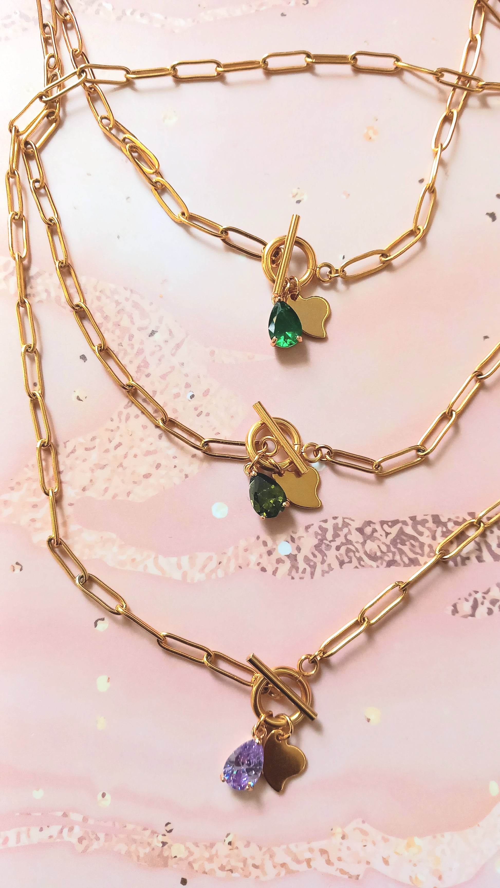 Colliers chaine trombone en acier inoxydable doré fermoir à bascule et pendentif strass et coeur en acier inoxydable